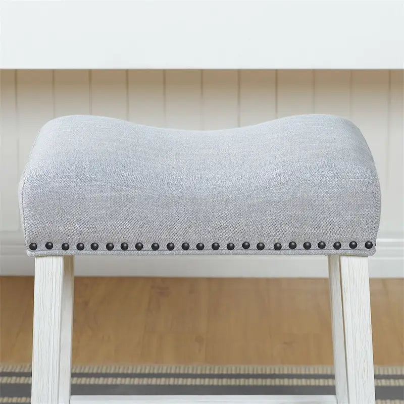 Taburete de mostrador con asiento tapizado tipo silla de montar, ribete con tachuelas, patas de madera de caucho, sin respaldo
