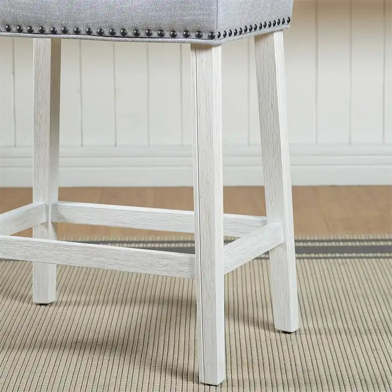 Taburete de mostrador con asiento tapizado tipo silla de montar, ribete con tachuelas, patas de madera de caucho, sin respaldo