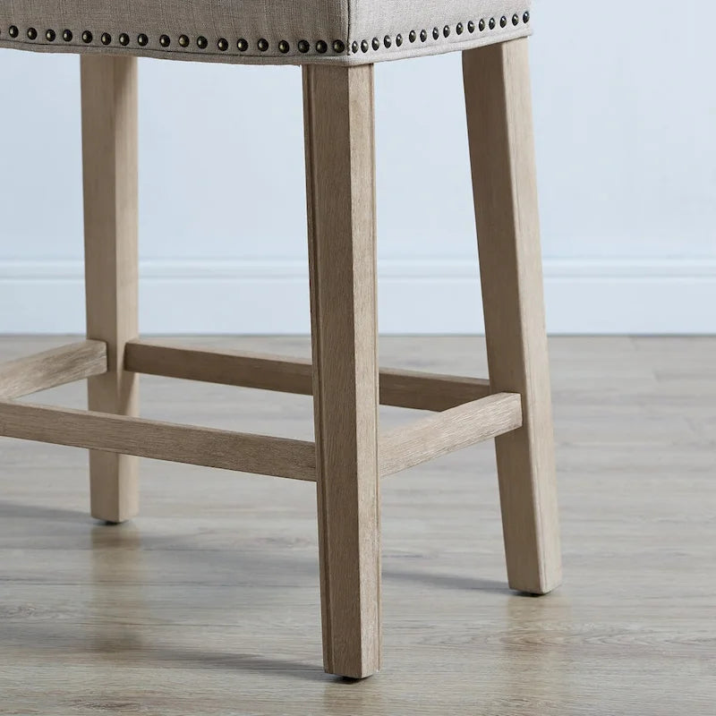 Taburete de mostrador con asiento tapizado tipo silla de montar, ribete con tachuelas, patas de madera de caucho, sin respaldo
